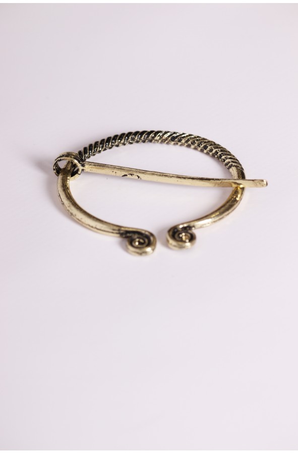 Fíbula Celta dorada o broche penanular