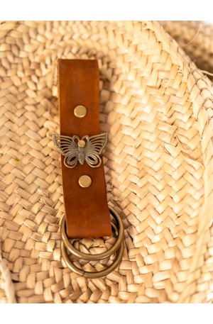 Sujetafaldas de cuero con...